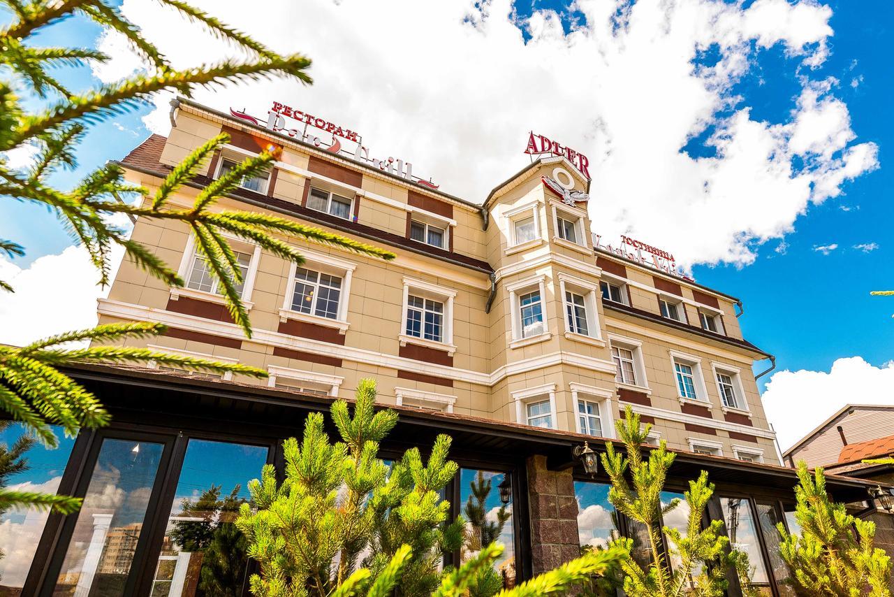 Hôtel Adler à Astana Extérieur photo