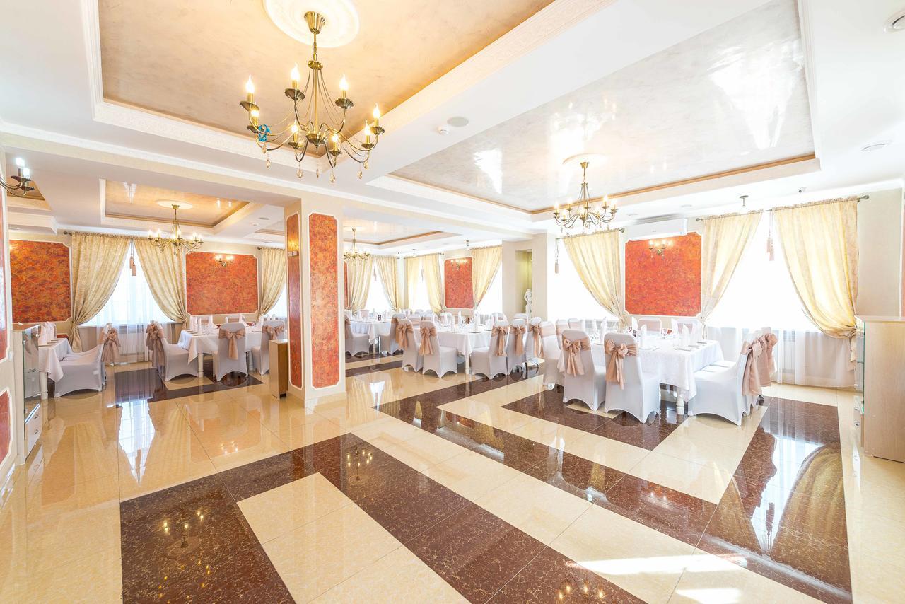 Hôtel Adler à Astana Extérieur photo